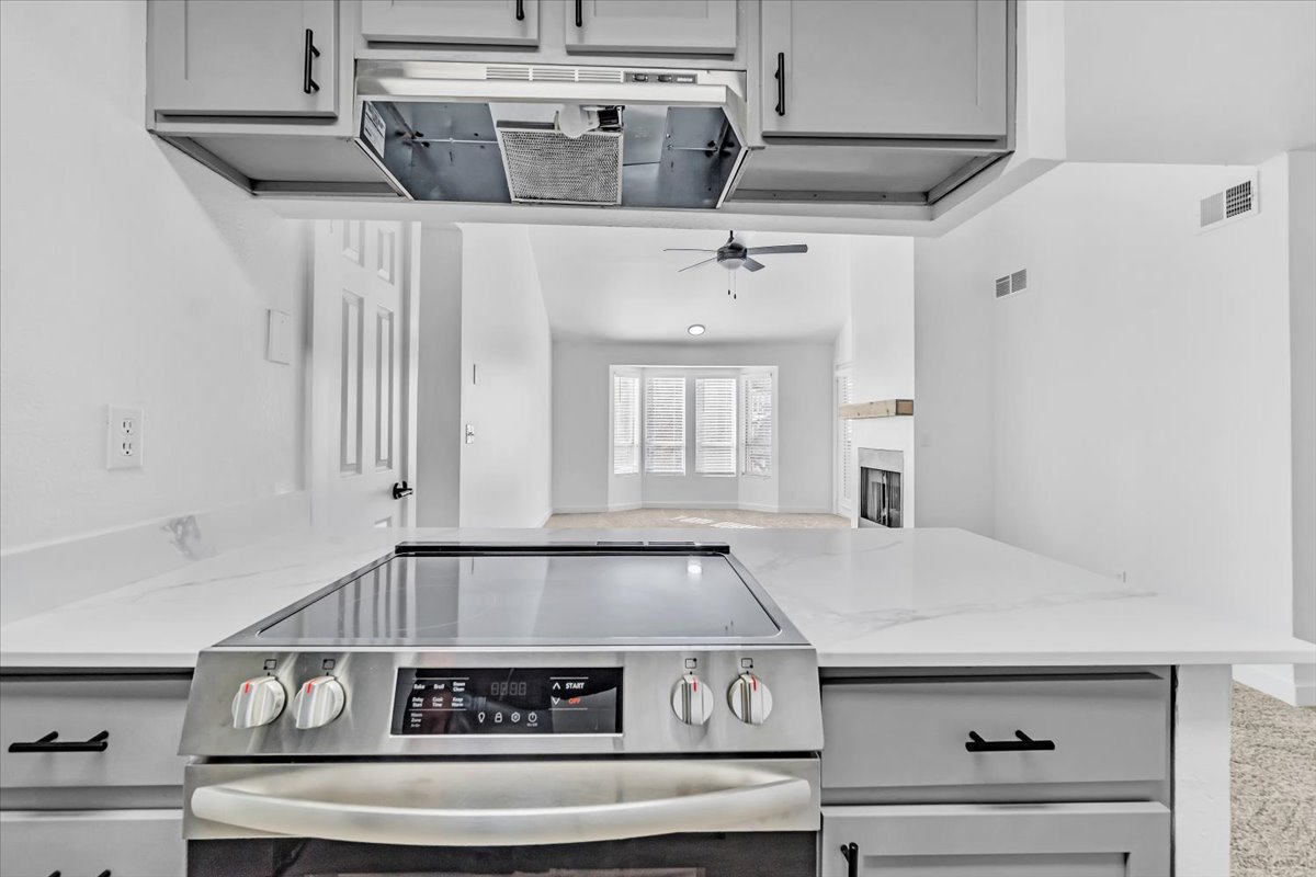 a black and white photo of a kitchen at The Residences at Bear Creek